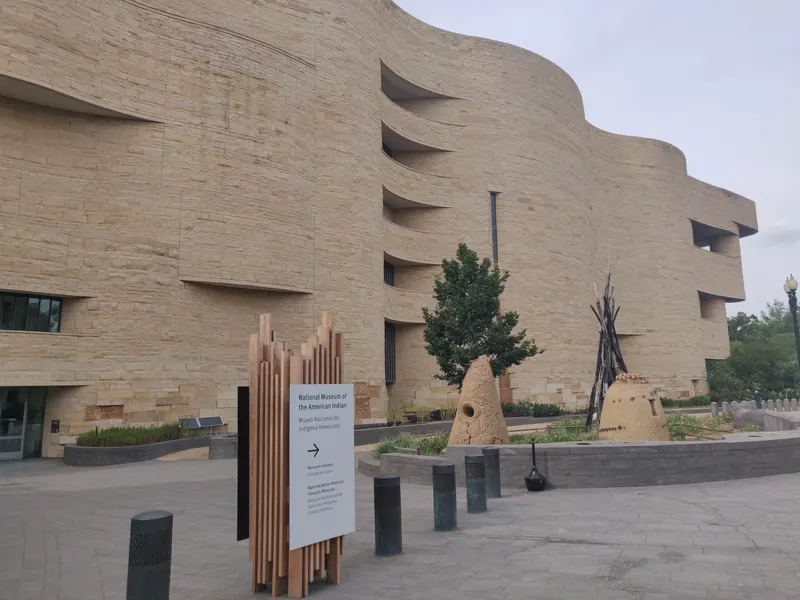 The curved limestone facade of the National Museum of the American Indian