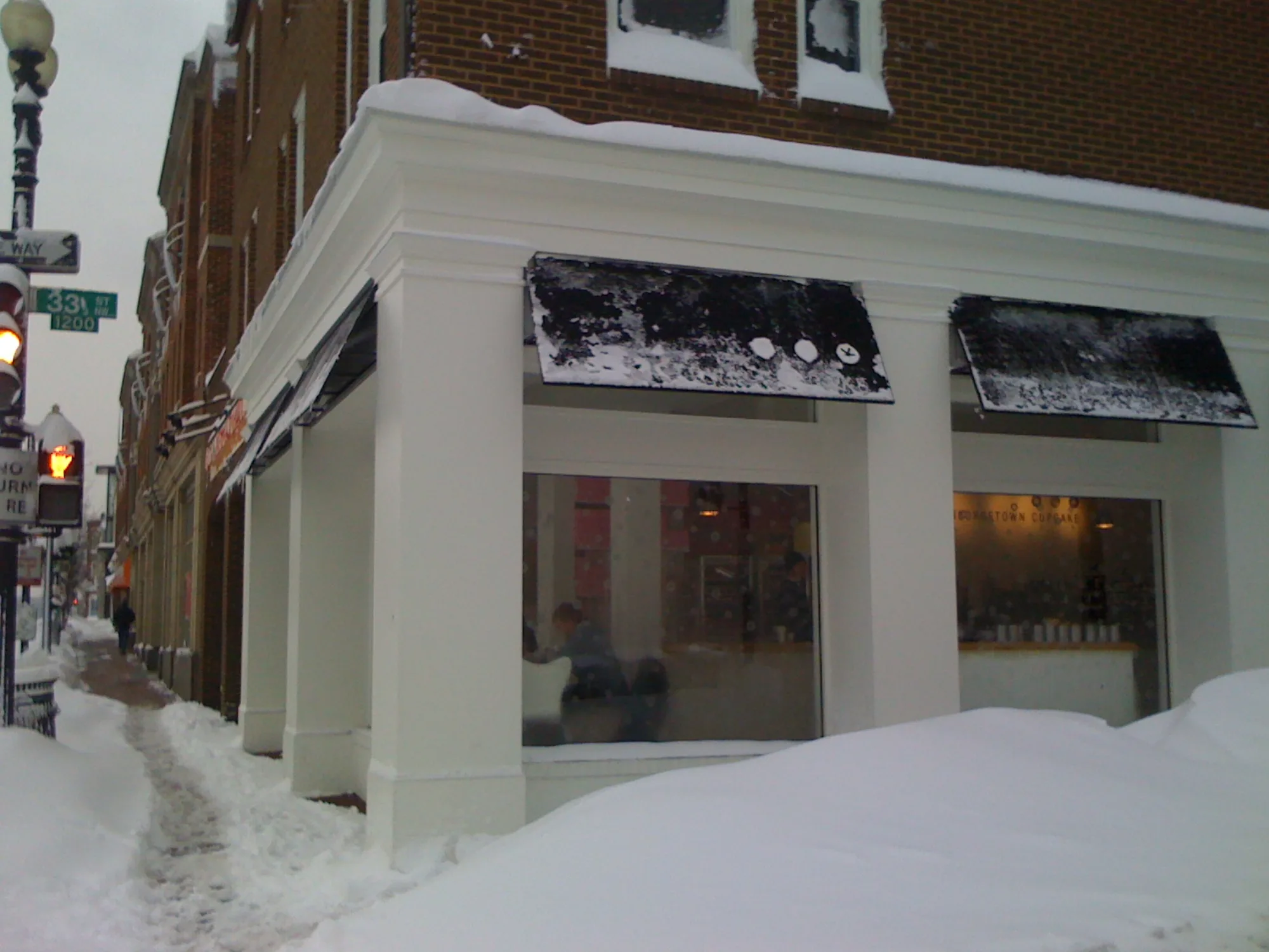 The Georgetown Cupcake storefront on M Street, a Georgetown sweets landmark, Washington, D.C.